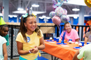 Girl at a Sky Zone surprise birthday party